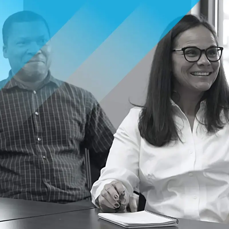 two people at a conference table