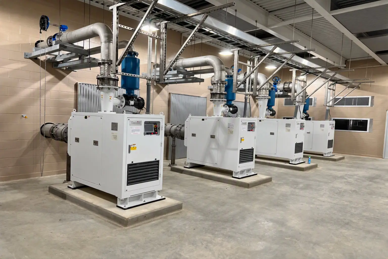 Interior of a waste water treatment building cooled by Bard exterior wall-mount HVAC systems.