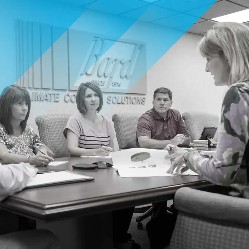 group of people in a meeting room