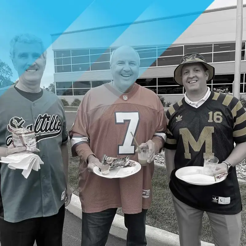 Three people eating food